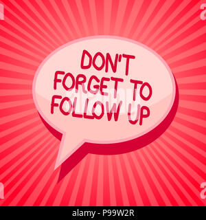 Handwriting text writing Don t not Forget To Follow Up. Concept meaning asking someone to keep connection with others Pink speech bubble message remin Stock Photo
