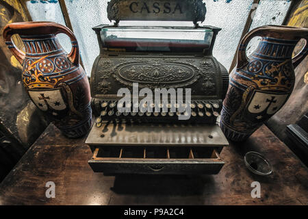 The cash of the old Pharmacy and Apothecary 'Farmacia di S. Maria della Scala' in Piazza della Scala in Trastevere quarter, Rome, Italy Stock Photo