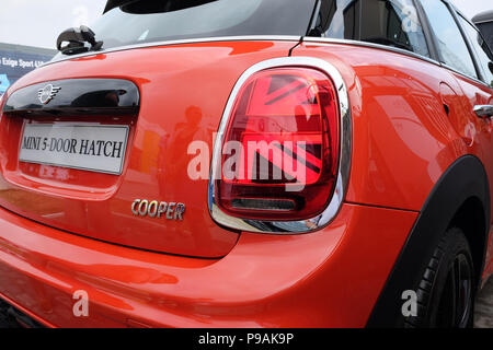 July 2018 - Details and close up of a bright red BMW Mini - Goodwood, Festival of Speed. Stock Photo
