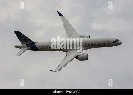 Farnborough, UK. 16th July 2018. An Airbus A220-300 performs in the flying display on the opening day of the 2018 Farnborough International Airshow, one of the biggest aviation trade and industry events in the world, held in the UK. Credit: James Hancock/Alamy Live News Stock Photo