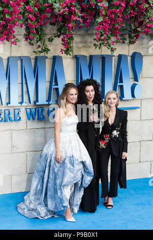 London, UK. 16th July 2018. Lily James, Cher and Amanda Seyfried arrive for the world film premiere of 'Mamma Mia! Here We Go Again' at Eventim Apollo, Hammersmith in London. Credit: Wiktor Szymanowicz/Alamy Live News Stock Photo