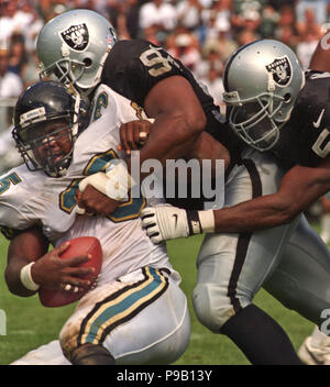 Oakland, California, USA. 15th Sep, 1996. Oakland Raiders vs. Jacksonville  Jaguars at Oakland Alameda County Coliseum Sunday, September 15, 1996.  Raiders beat Jaguars 17-3. Oakland Raiders running back Harvey Williams  Credit: Al