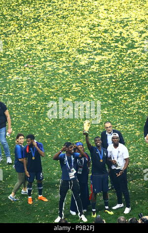 Moscow, Russia. 15th July, 2018. Paul Pogba (FRA) celebrates with the trophy and his family after winning the FIFA World Cup Russia 2018 Final match between France 4-2 Croatia at Luzhniki Stadium in Moscow, Russia, July 15, 2018. Credit: Kenzaburo Matsuoka/AFLO/Alamy Live News Stock Photo