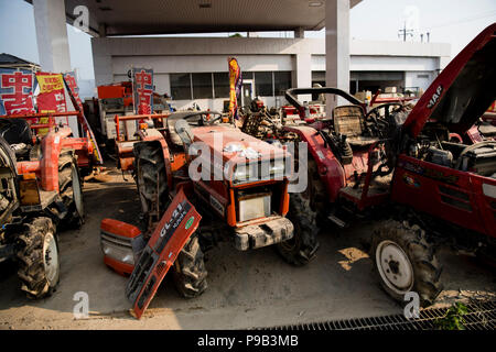 Okayama, Japan. 17th July 2018. Farm equipment damaged in floods in Mabicho, Kurashiki, Okayama Prefecture, Japan. More than 200 people died in floods and landslides caused by torrential rains more than a week ago. On Sunday, the government announced the weather event would be designated an extremely severe disaster, freeing up recovery funds for the affected areas. Cleanup and recovery efforts have been hampered by extreme heat. Credit: Aflo Co. Ltd./Alamy Live News Stock Photo