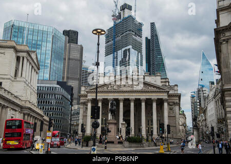 London, UK. 17th July 2018. New mammoth skyscrapers continue to rise up and dominate the traditional buildings of the Bank of England and the Royal Exchange in the City of London. Credit: Guy Bell/Alamy Live News Stock Photo