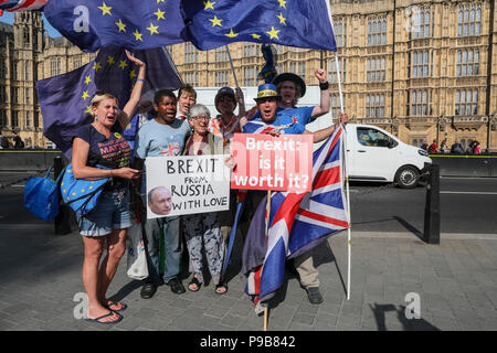 Westminster, 17th July 2018. Labour MEP Julie Ward chats to and poses with anti-Brexit demonstrators from SODEM (Stand Of Defiance European Movement, a daily protest outside Parliament organised by activist Steve Bray. Credit: Imageplotter News and Sports/Alamy Live News Stock Photo