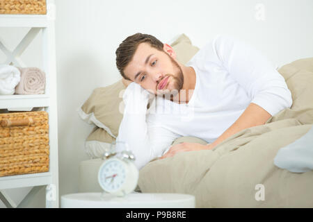 man having trouble waking up in the morning Stock Photo