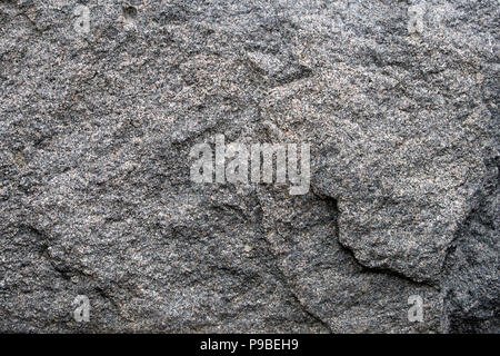 Gray natural stone texture, relief granite surface, may be used as background Stock Photo