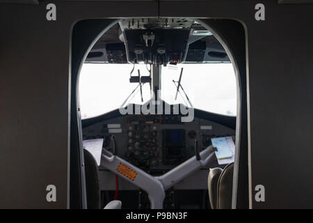 Interior details of airplane cockpit board control background, on white background. Stock Photo