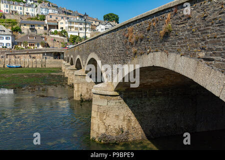 Looe Cornwall England July 12, 2018 Bridge across the East Looe River joining East and West Looe Stock Photo