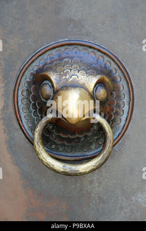 eagle face as a door knocker at a church in cologne Stock Photo