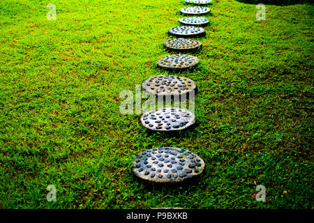 Landscaping in the garden. The path way to home Stock Photo