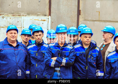 Group of  builders in hardhats. Business, building, teamwork and people concept. Stock Photo