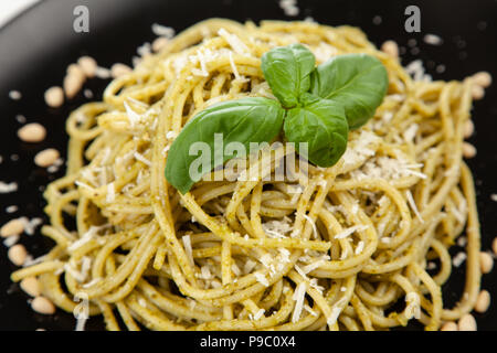 Pasta with pesto sauce Stock Photo