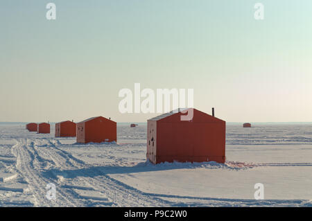 Ice Fishing Shack On Frozen Lake At Sunset Stock Photo - Alamy