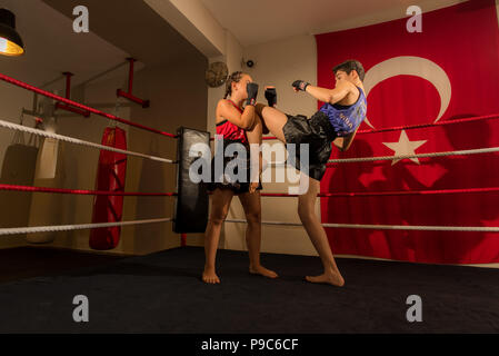 mma boxing muay thai boxer kick junior female young fighter alamy