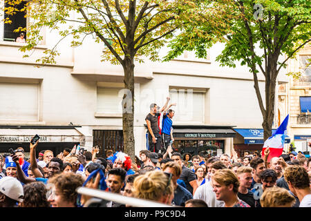 Paris, France. 15th July, 2018. Large crowds celebrate in the streets of Paris after France wins the 2018 FIFA World Cup Russia. Paris, France. Stock Photo