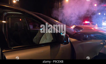 The aftermath of a car crash accident. Car crash dangerous accident on the road. Stock Photo