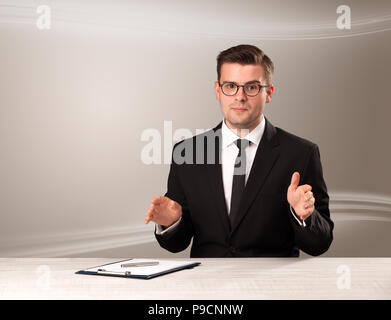 Televison presenter host in live show with blank background Stock Photo
