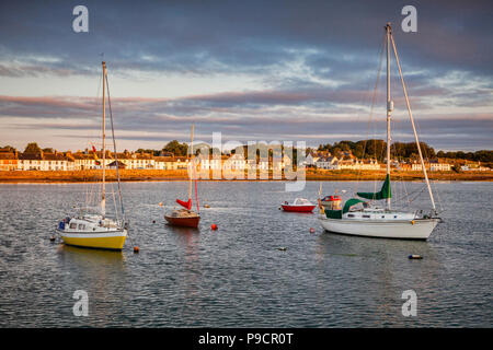 Boats moored in the harbour of the fishing village of Garlieston in Wigtownshire, Dumfries and Galloway, Scotland. Stock Photo