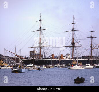 AJAXNETPHOTO. JUNE, 1987. PORTSMOUTH, ENGLAND. - HMS WARRIOR - FIRST AND LAST IRONCLAD SHIP ENTERING THE HARBOUR AFTER HER TOW FROM HARTLEPOOL WHERE THE VICTORIAN IRONCLAD WAS RESTORED. PHOTO:JONATHAN EASTLAND/AJAX REF:876776 46 Stock Photo