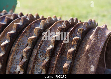 old rusty farming roller agricultural tool for soil close up Stock Photo