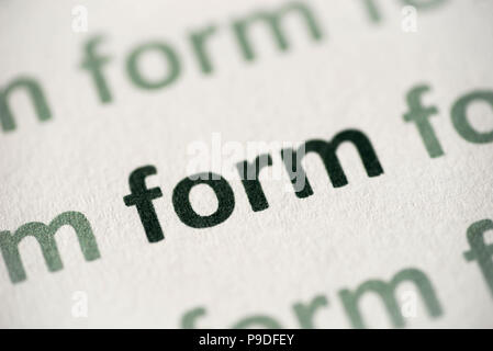 word form printed on white paper macro Stock Photo