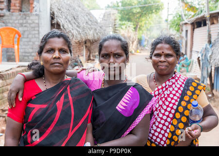 PONDICHERY, PUDUCHERRY, TAMIL NADU, INDIA - SEPTEMBER CIRCA, 2017. Portrait of a unidentified happy woman with children outdoors Stock Photo