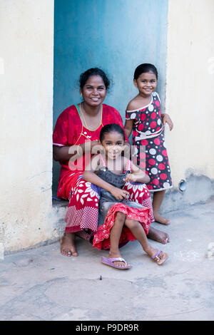 PONDICHERY, PUDUCHERRY, TAMIL NADU, INDIA - SEPTEMBER CIRCA, 2017. Portrait of a unidentified happy woman with children outdoors Stock Photo