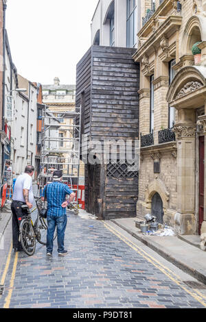 A film set, setting up and building false fronts to shops and windows in hull Stock Photo