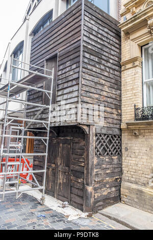 A film set, setting up and building false fronts to shops and windows in hull Stock Photo