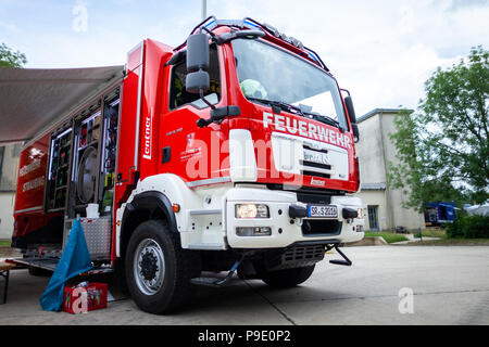 FELDKIRCHEN / Germany - JUNE 9, 2018: German fire engine stands on a platform on open day. The german word Feuerwehr means fire department. Stock Photo