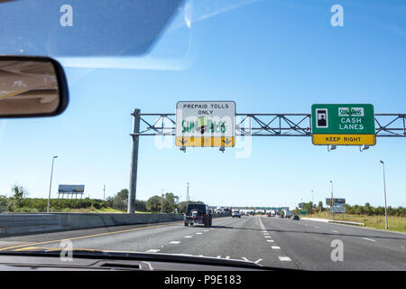 Florida Turnpike highway toll booths with SunPass lanes during the ...