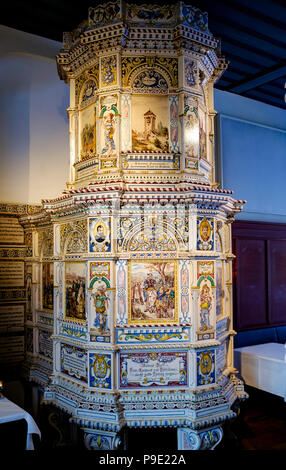 Basel, tiled ceramic stove 16th century in the Guild House Zunft zum Schlüssel, Schlusselzunft restaurant, Switzerland, Europe, Stock Photo