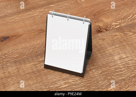 Blank portrait table top flip chart easel binder or calendar mockup standing on wooden background. 3d illustration Stock Photo