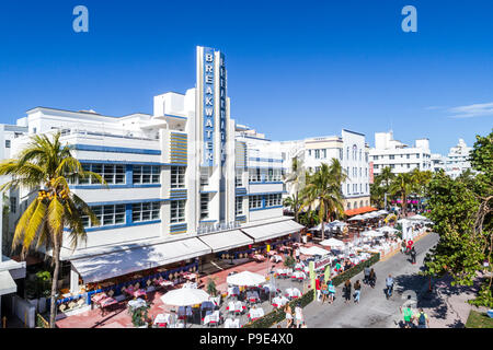 Miami Beach Florida,Ocean Drive,Breakwater,hotel,restaurant restaurants food dining cafe cafes,al fresco,sidewalk outside tables dining street cafe,um Stock Photo