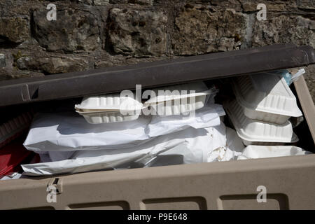 Discarded takeway food packaging in waste bin Scotlandand Stock Photo