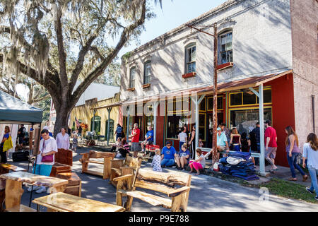 Florida,Micanopy,Fall Harvest Festival,annual small town community booths stalls vendors buying selling,general store Mott-May building,1900,historic Stock Photo