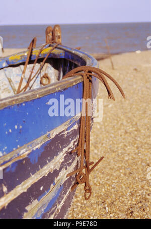 Old wooden boat on beach Stock Photo