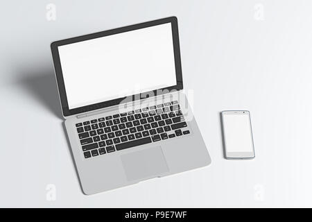 Blank screen laptop and smartphone isolated on white background with clipping path. 3d illustration Stock Photo