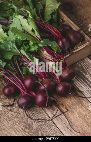 Fresh homegrown beetroots on wooden rustic table Stock Photo