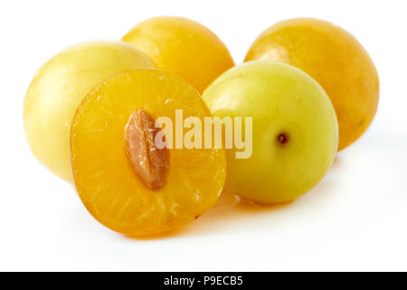 Yellow cherry plums also known as mirabelle plums isolated on white background Stock Photo
