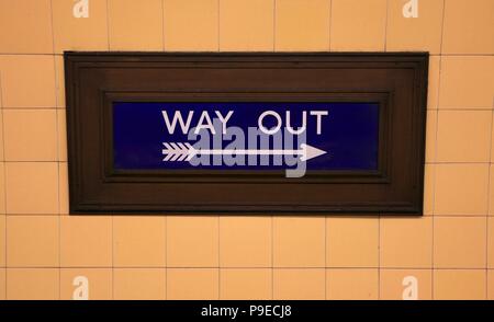 Way Out Sign in Southgate Underground Station (Pointing Right) Stock Photo