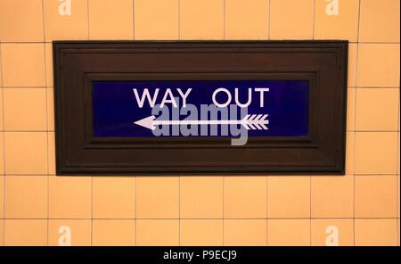 Way Out Sign in Southgate Underground Station (Pointing Left) Stock Photo