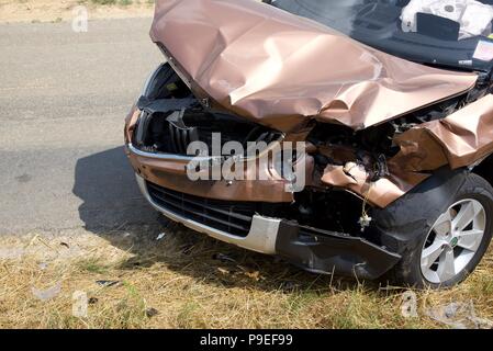 Car crash: the aftermath of a head-on collision (no injuries) on a rural French road with a British owned car and a French courier van (removed) Stock Photo