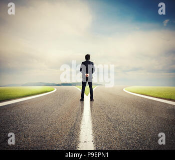 Choices of a businessman at a crossroads. Concept of decision Stock Photo