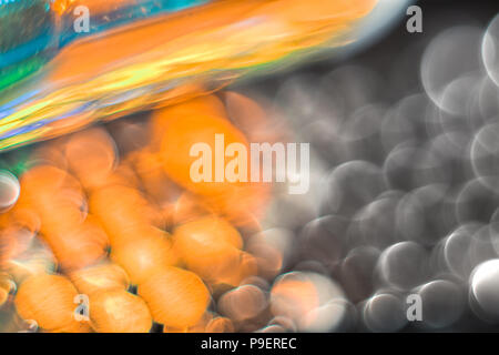 Blurry abstract futuristic wallpaper. Car headlight macro. Stock Photo