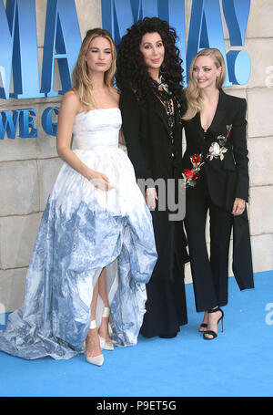 Jul 16, 2018  - Lily James, Cher and Amanda Seyfried attending 'Mamma Mia! Here We Go Again' - World Premiere, Hammersmith Apollo in London, England,  Stock Photo