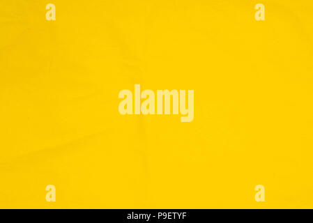 yellow color creased tissue paper background texture Stock Photo