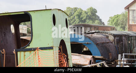 Derelict and rusting steam engine parts at the Cambrian Heritage Railway museum in Oswestry UK Stock Photo